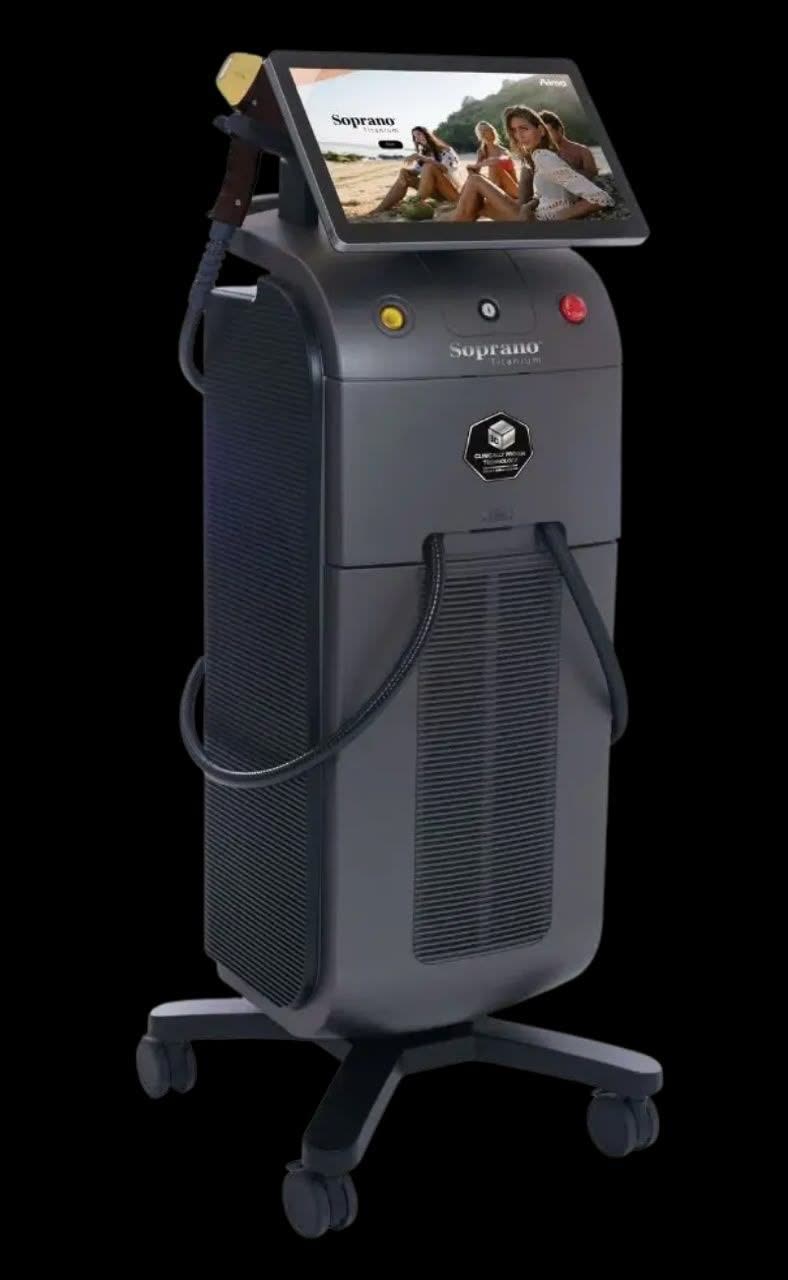 The Soprano Titanium diode-laser system — full treatment console with applicator handpiece — Nue Skin Beauty Esthetique